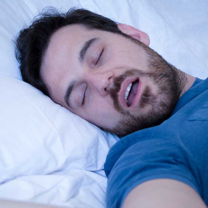 Man snoring while sleeping