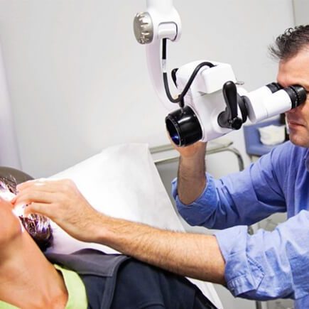 ENT taking a closer look inside a patient's ear.